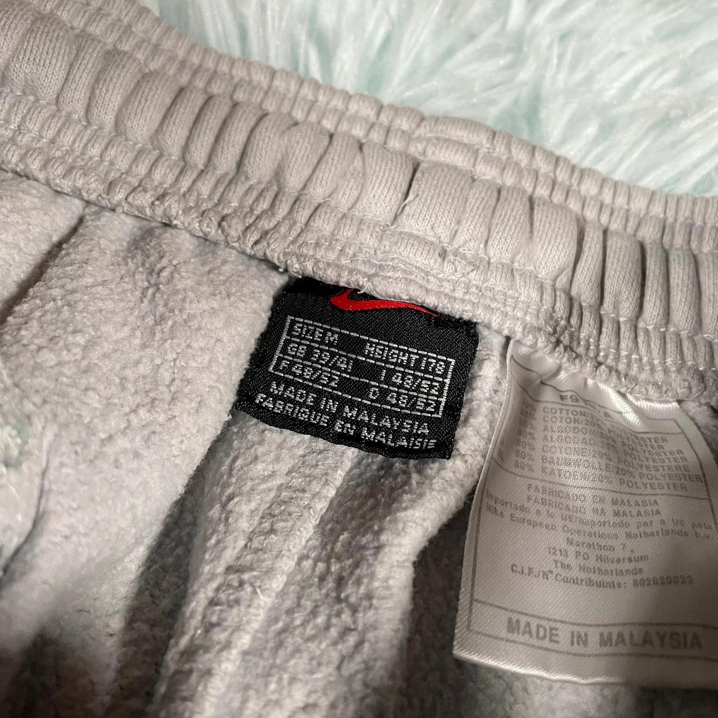 Vintage 90s Light blue Nike Joggers - Medium